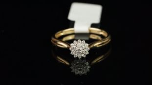 Diamond cluster ring, round brilliant cut diamonds weighing an estimated total of 0.15ct, set in 9ct