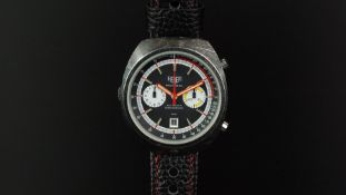 GENTLEMEN'S HEUER MONTREAL CHRONOGRAPH WRISTWATCH, circular black twin register dial with a date