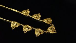 Art Nouveau necklace mounted in yellow metal, with seven ivy leaf designed triangular panels,