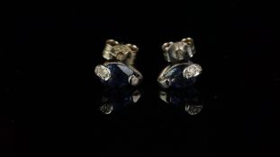A pair of sapphire and diamond ear studs in 9ct white gold