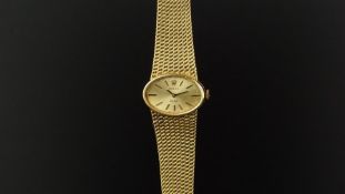 LADIES' ROLEX ORCHID 18ct GOLD WRISTWATCH, oval light gold dial with gold and black hour markers and