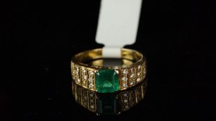 Emerald and diamond ring, mounted in yellow metal, stamped with the French eagle's head for 18ct