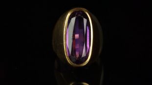 Single stone oval amethyst ring, with two inscriptions inside the shank reading 'David 4.9.57'