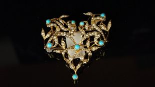 Turquoise and pearl brooch in a fancy floral design, stamped 15ct to the reverse, with pin and