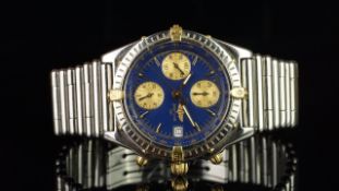 BREITLING CHRONOMAT REF B13050.1, circular blue dial, triple register chronograph dials in gold,