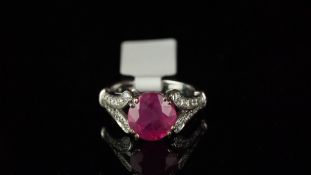 Burma ruby and diamond ring, mounted in white metal stamped with the French owl import mark, central