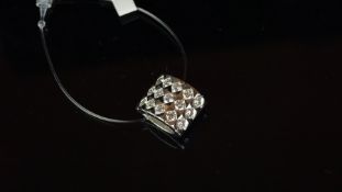 Diamond set pendant, set with fifteen round brilliant cut diamonds in three columns, mounted in