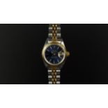 LADIES' ROLEX OYSTER PERPETUAL DATE JUST REF: 7913, circular blue dial, baton hour markers, steel