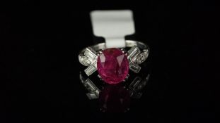 Burma pink sapphire and diamond ring, mounted in white metal with French import marks for 18ct and