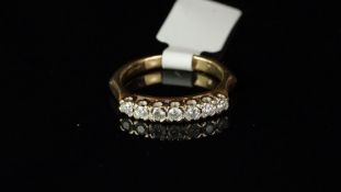 Seven stone diamond half eternity ring, round brilliant cut diamonds, mounted in 9ct yellow gold,