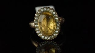 Georgian citrine and pearl oval cluster ring, mounted in unmarked yellow metal, central oval citrine