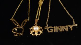 Selection of three pendants, comprising a personalised pendant with the name Ginny on an