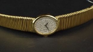 LADIES' PIAGET 18ct GOLD DIAMOND DIAL WRISTWATCH CIRCA 1980, circular full diamond set dial with