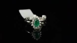 Emerald and diamond pear shaped cluster ring, central pear shaped emerald, claw set, surrounded by