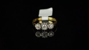 Three stone diamond ring, three round brilliant cut diamonds weighing an estimated total of 0.