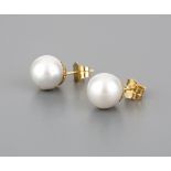 A pair of Australian cultured pearl stud earrings. The saltwater cultured pearls to post and