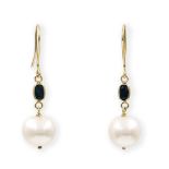 A pair of cultured pearl and sapphire earrings. The freshwater cultured pearls of baroque form