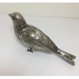 Antique Continental silver bird spice shaker with red eyes