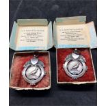 2 boxed Antique Silver Pigeon Racing Medals