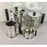 Silver plated trench art 4 piece tea service made from ww2 shells