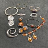 Selection of Silver Jewellery some set with Amber includes bracelets earrings brooches Etc