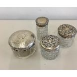 Four Silver Topped Trinket Boxes