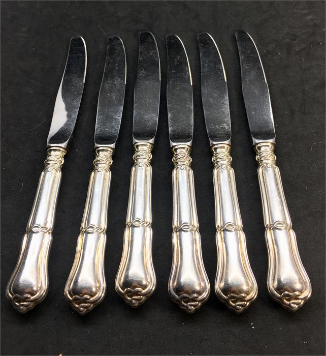 Set of 12Large silver handle Table Knives each measures approx 25cm long hallmaked 925 on handle wit