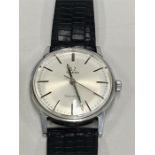 Vintage Omega Geneve Seamaster stainless steel case watch winds and ticks
