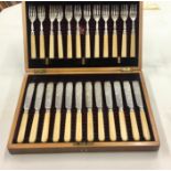 Victorian Silver 12 setting fish knifes and forks in original mahogany case