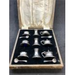 Antique Boxed 9 piece Cruet Set Blue glass liners all in good condition