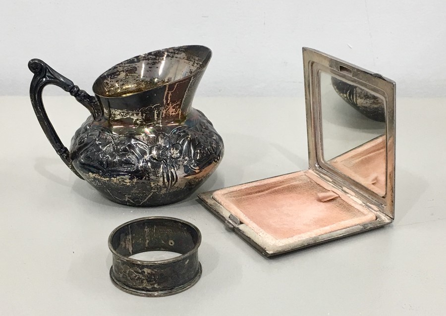 3 Silver items includes silver cream jug napkin ring and silver Compact total weight 186g