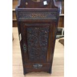 Mahogany smokers cabinet, carved door, fretted top