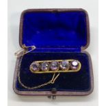 Antique Boxed stone set Brooch measures approx 41mm long not hallmarked but acid tests as gold comes