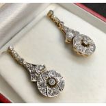 Pair of 18ct Gold and Diamond Drop earrings lengh 31mm drop by 12mm at widest points not hallmarked