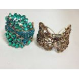 2 Large Designer Costume Bracelets by Butler and Wilson all set with stones in good condition 1 wit