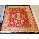 Red ground ziegler rug measures approx 2.3m by 1.6m