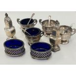 Selection Silver items includes 4 salts and matching spoons 2 pepper pots etc