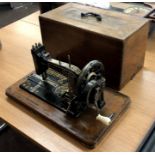 Antique Sewing Machine with wooden box.