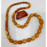 Antique Egg Yolk Amber Bead Necklace with chunk of amber , Necklace weight 32g
