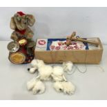 two vintage toys includes Pelham Puppet Poodle, Dog Boxed 1950s and a Cragstan Melody Band Elephant