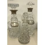 3 Glass decanters 2 with hallmarked silver rims with silver decanter labels all Hallmarked