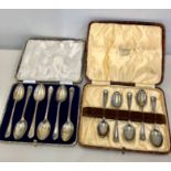 2 Boxed silver Tea spoons includes .set of 6 golf motif spoons and other has 1 missing silver total