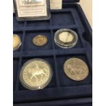 collection of silver coins includes £5 coin silver 50p coin £2 silver coin etc