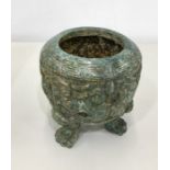 Chinese Jade type censer of tripod form, cylindrical relief decorated with stylised taotie masks
