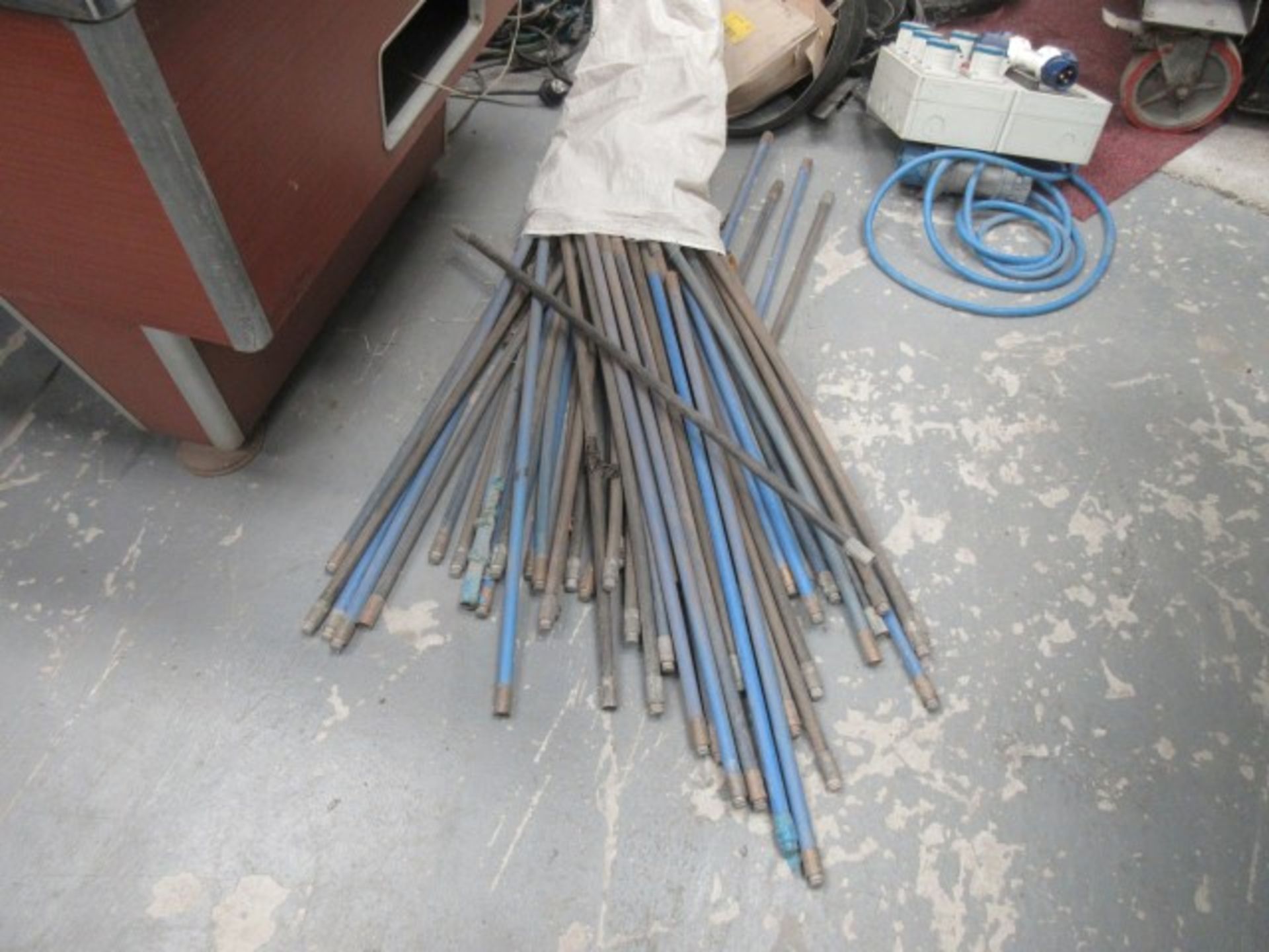 A large quantity of drain rods