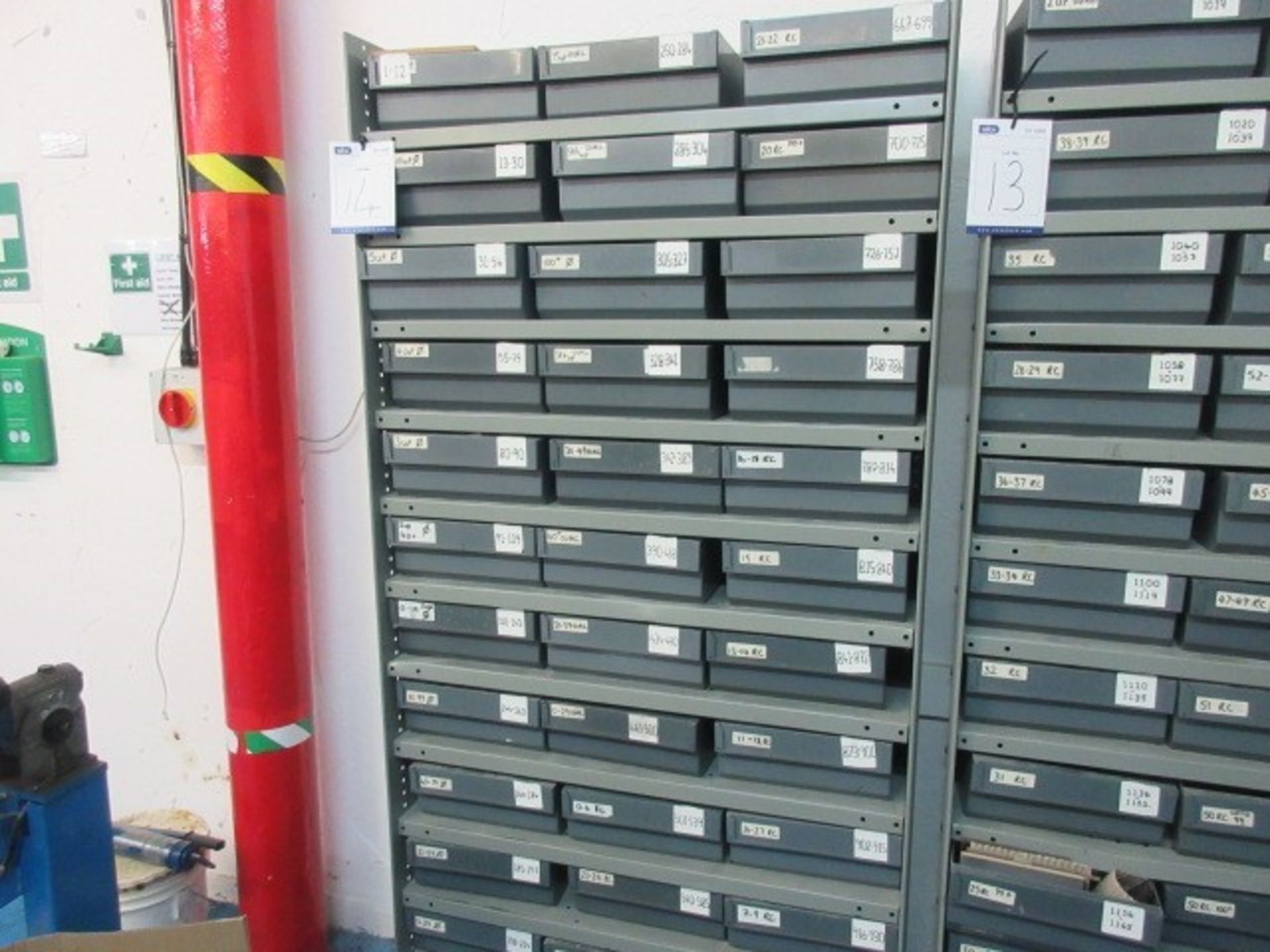 A Qty of assorted cutters in and including 36 drawer storage unit.