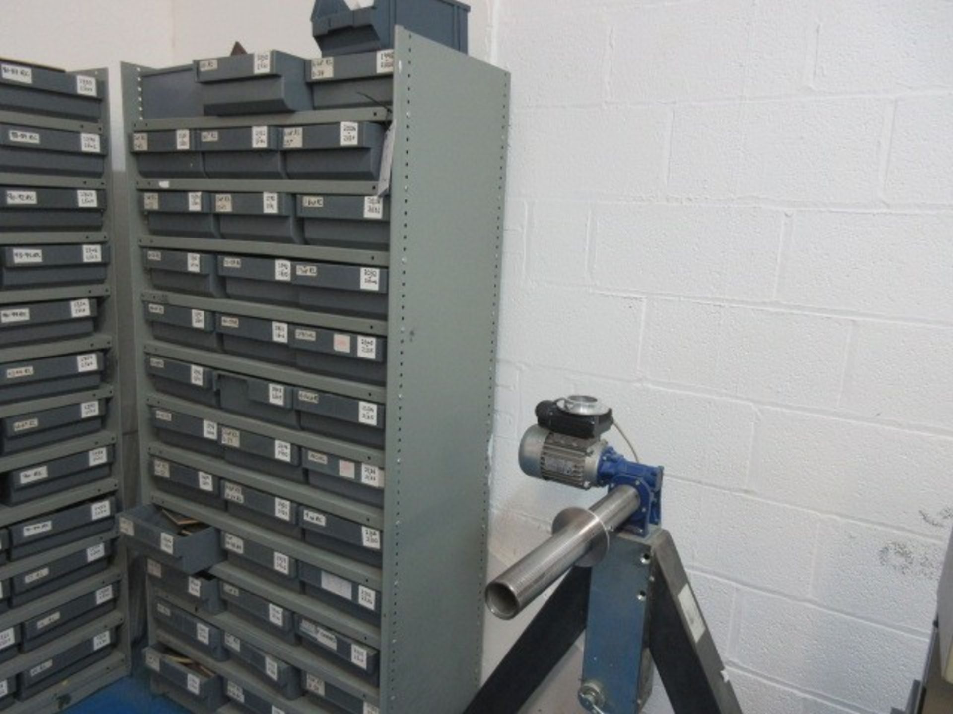 A Qty of assorted cutters in and including 36 drawer storage unit.