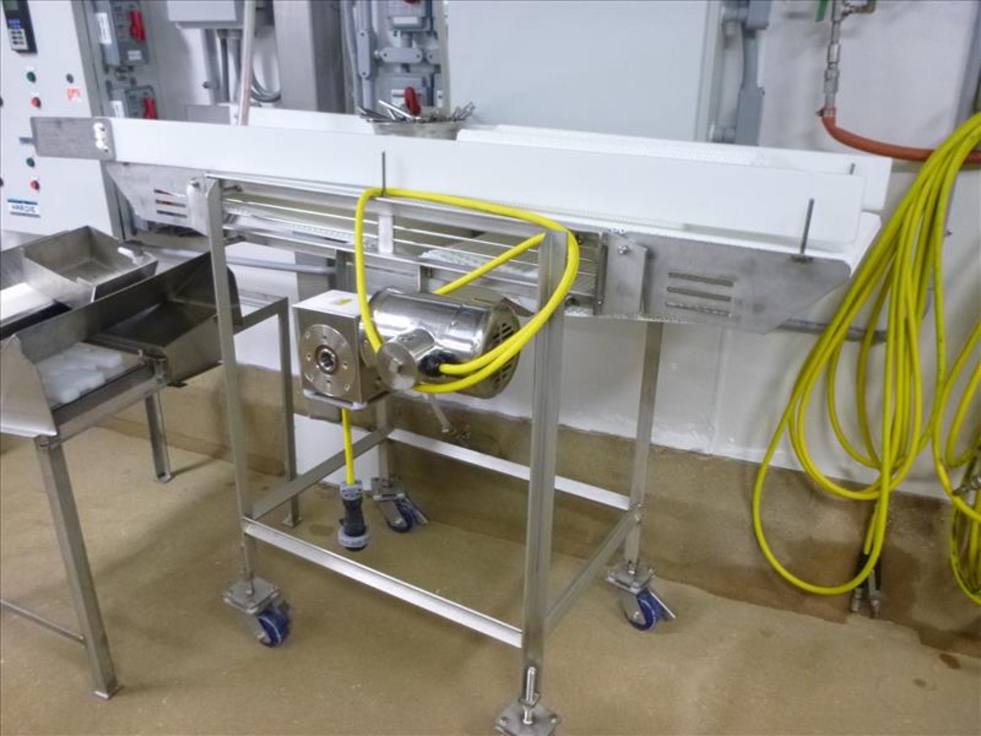 approx. 16 in. x 6 ft. s/s frame belt conveyor on casters, c/w flat plastic belt, 1/2 h.p. drive (