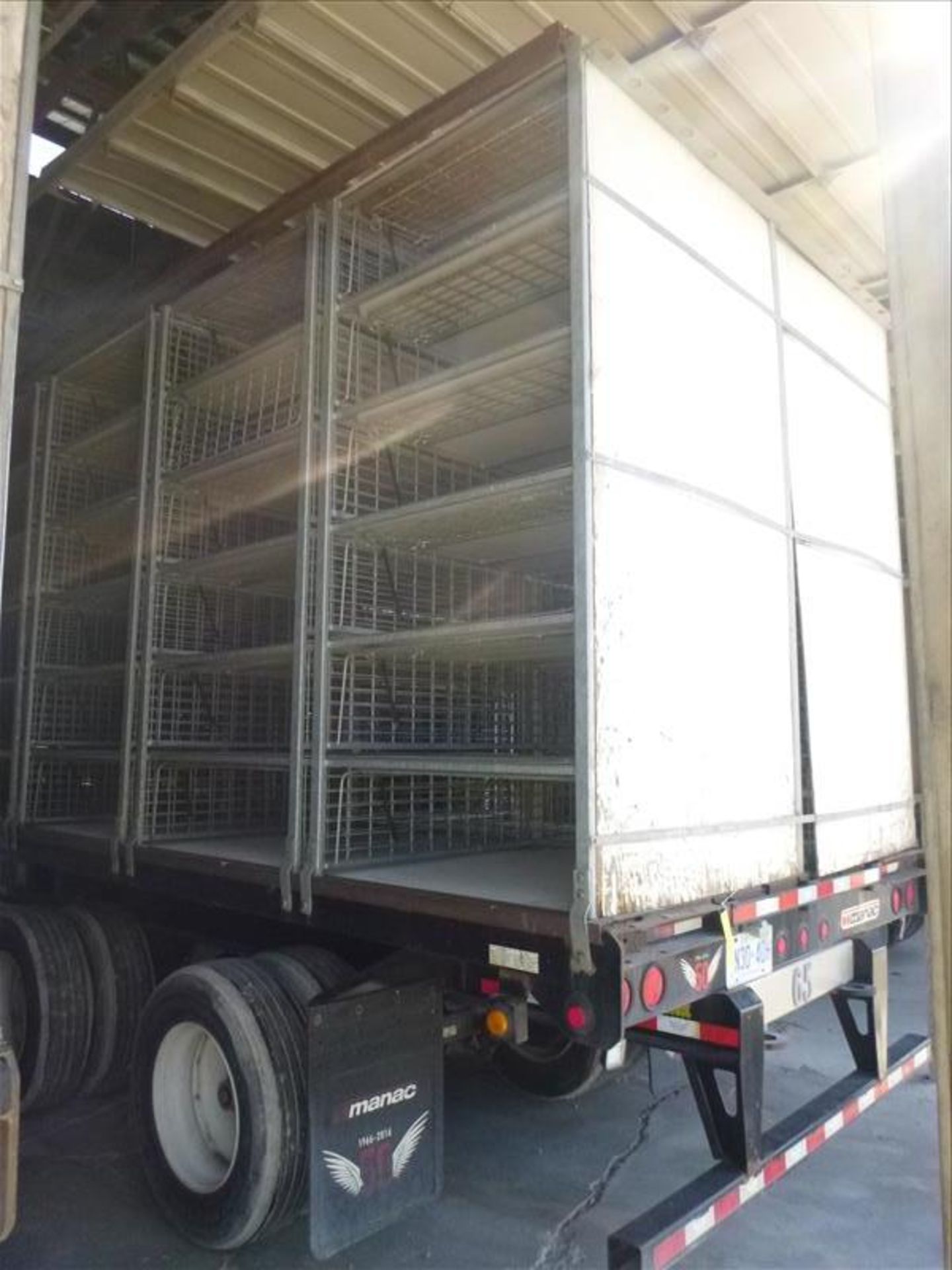 2017 Manac 53 ft tandem axle flat-bed trailer c/w turkey cages, & side curtains (Unit #65), - Image 2 of 4