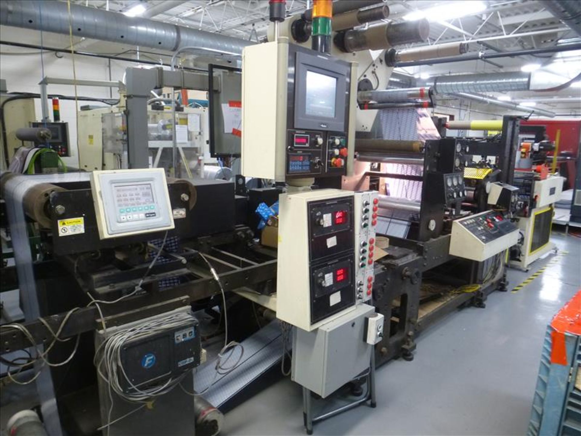 Comco Press "A" - 1999 Comco 8-colour, roll-to-roll flexographic web printing press, model ProGlide,